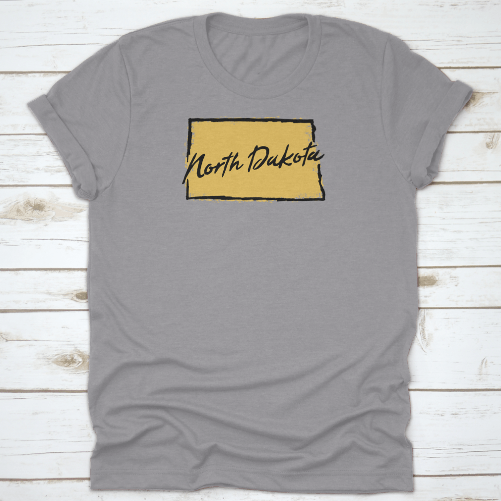 Hand drawn North Dakota state design t-shirt showcasing scenic landscapes, made from 100% cotton for comfort.