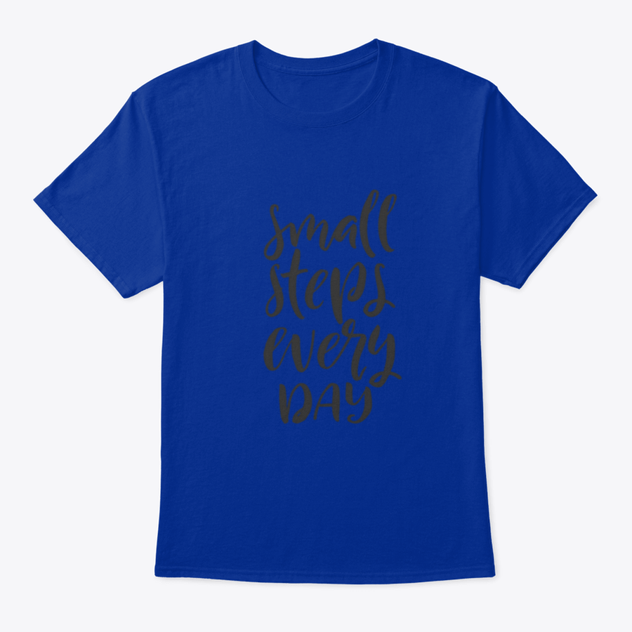 A stylish t-shirt featuring hand-drawn brush pen lettering with the phrase 'Small Steps Every', showcasing its comfortable fit and quality fabric.