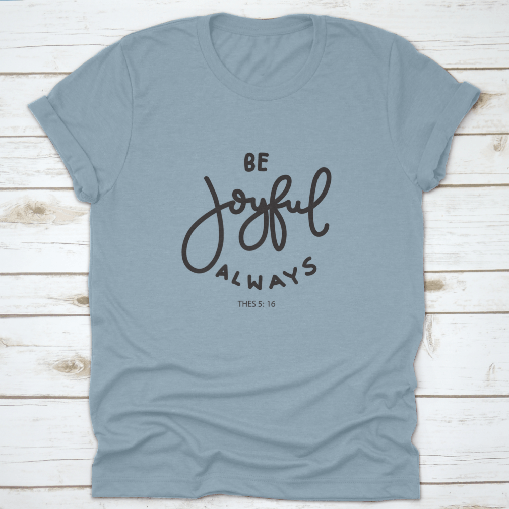 Hand Lettering Be Joyful Always T-shirt on a white background, showcasing modern design and inspirational quote.