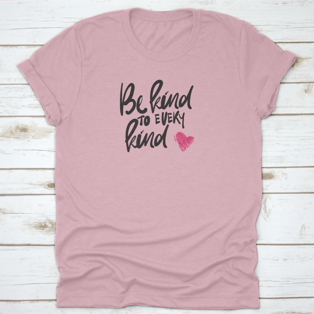 A stylish t-shirt featuring hand lettering design 'Be Kind To Every Kind', made from soft cotton fabric.
