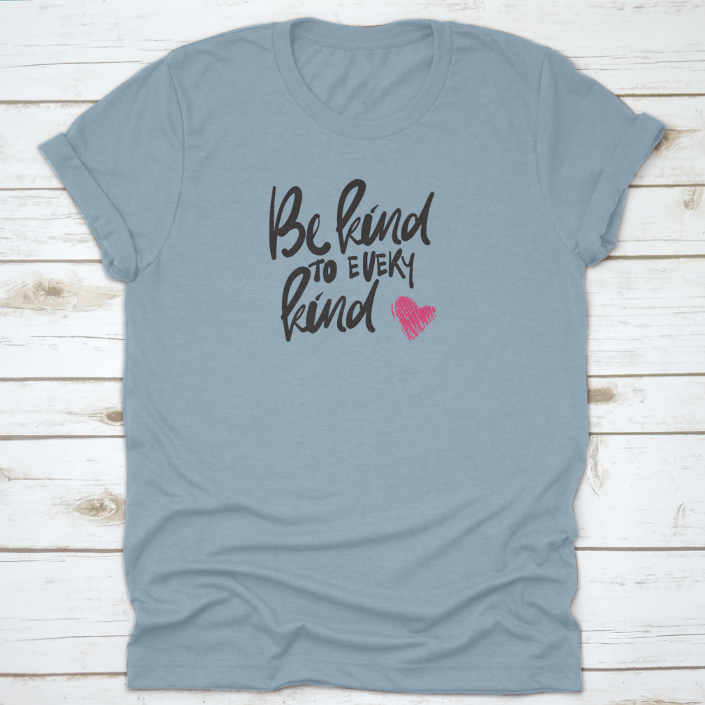 A stylish t-shirt featuring hand lettering design 'Be Kind To Every Kind', made from soft cotton fabric.