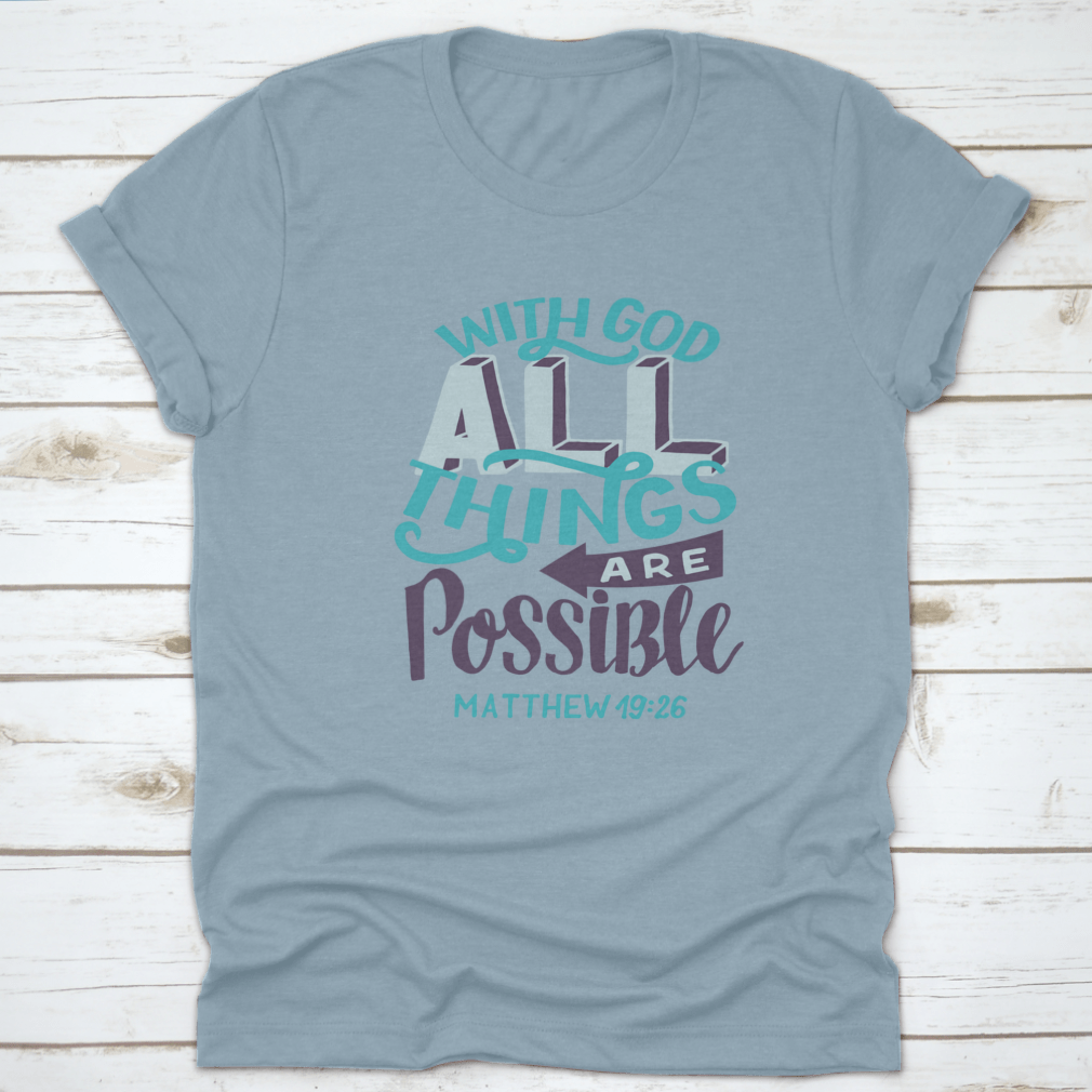 A stylish t-shirt featuring hand lettering of the Bible verse 'With God All Things Are Possible', showcasing a classic fit and soft fabric.
