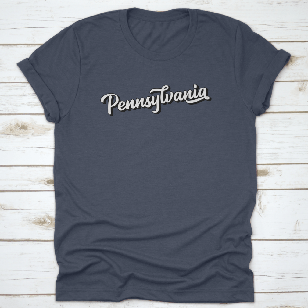 Hand sketched Pennsylvania text design featuring vintage 3D lettering on a soft cotton fabric, showcasing a unique retro style.