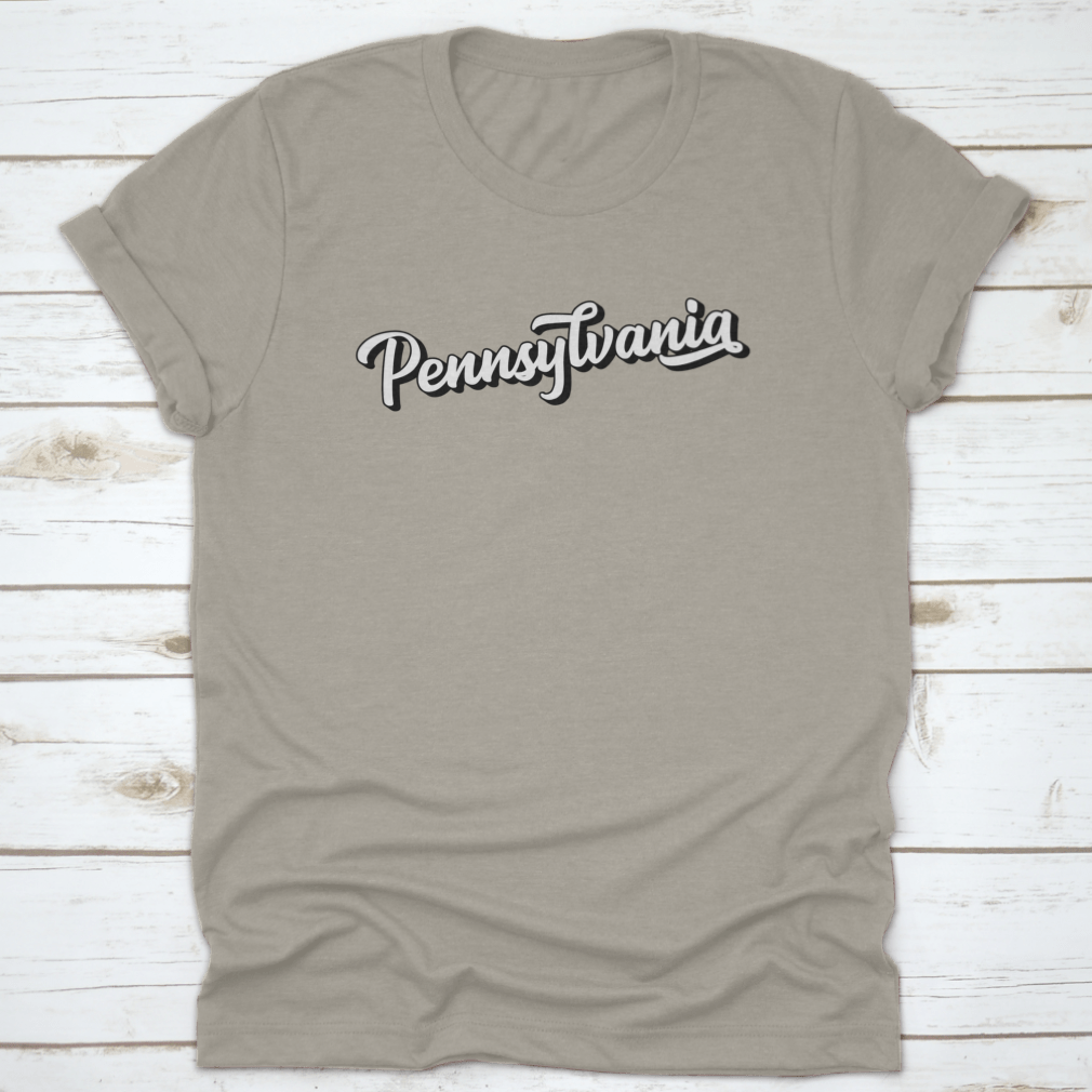 Hand sketched Pennsylvania text design featuring vintage 3D lettering on a soft cotton fabric, showcasing a unique retro style.
