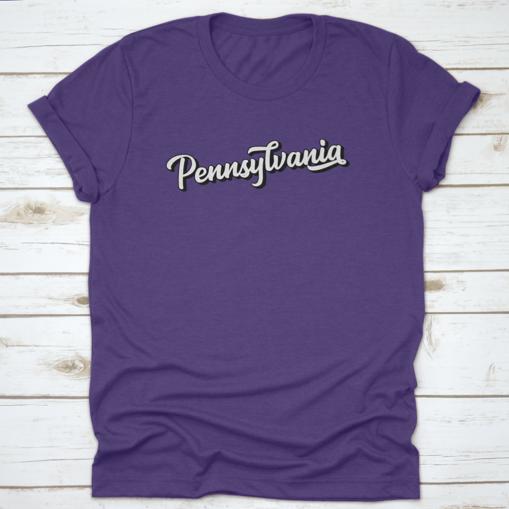 Hand sketched Pennsylvania text design featuring vintage 3D lettering on a soft cotton fabric, showcasing a unique retro style.
