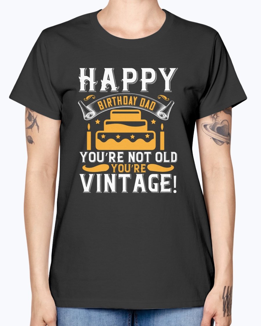 A stylish T-shirt with the phrase 'Happy birthday, Dad! You’re not old, you’re vintage!' printed on it, showcasing a vintage design.