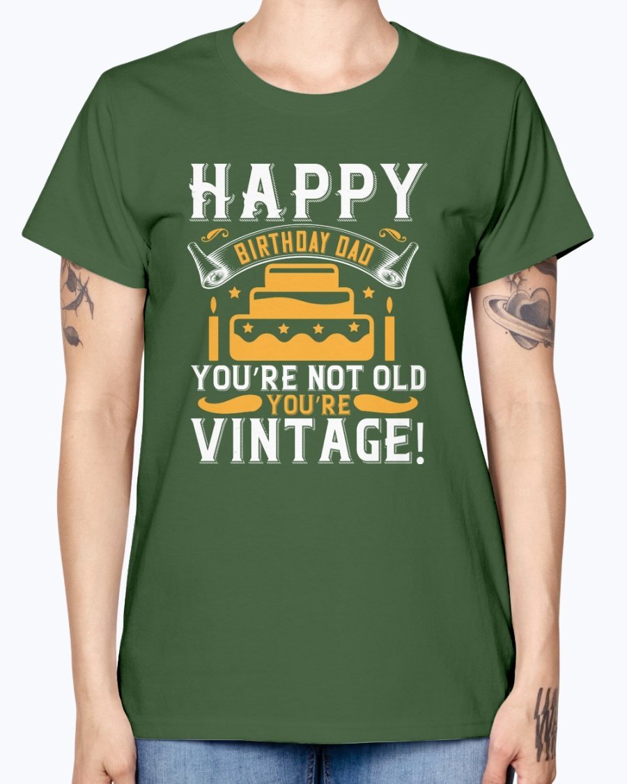 A stylish T-shirt with the phrase 'Happy birthday, Dad! You’re not old, you’re vintage!' printed on it, showcasing a vintage design.