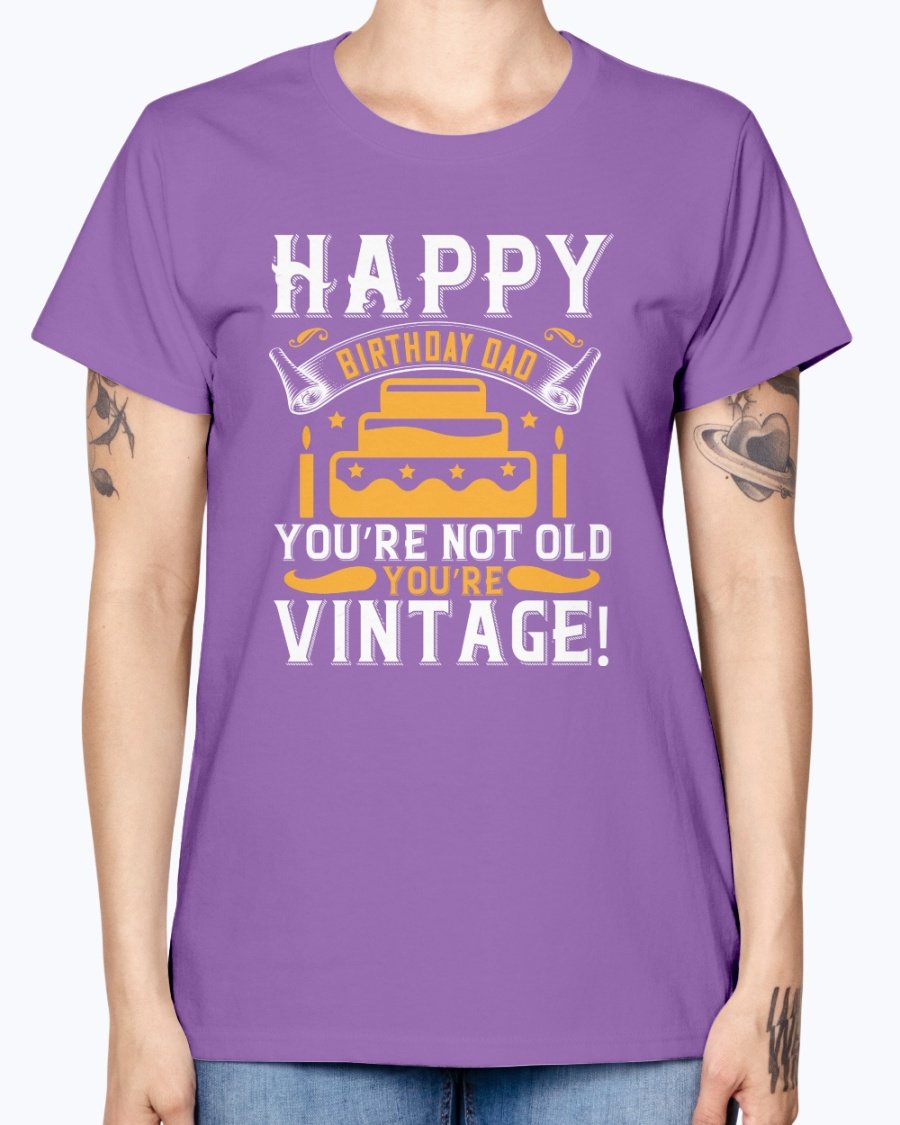 A stylish T-shirt with the phrase 'Happy birthday, Dad! You’re not old, you’re vintage!' printed on it, showcasing a vintage design.