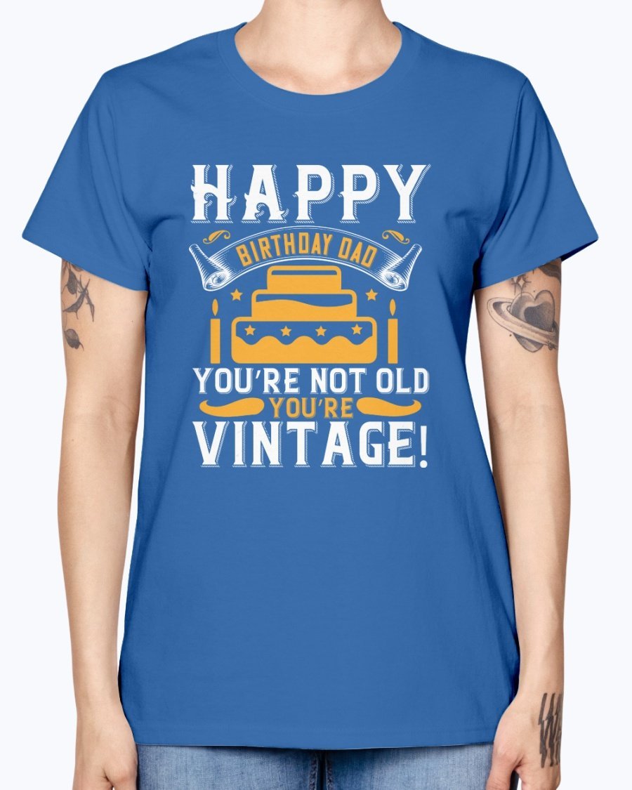 A stylish T-shirt with the phrase 'Happy birthday, Dad! You’re not old, you’re vintage!' printed on it, showcasing a vintage design.