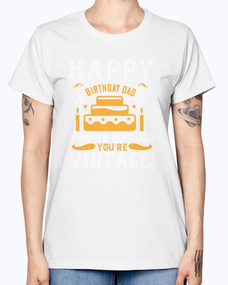 A stylish T-shirt with the phrase 'Happy birthday, Dad! You’re not old, you’re vintage!' printed on it, showcasing a vintage design.