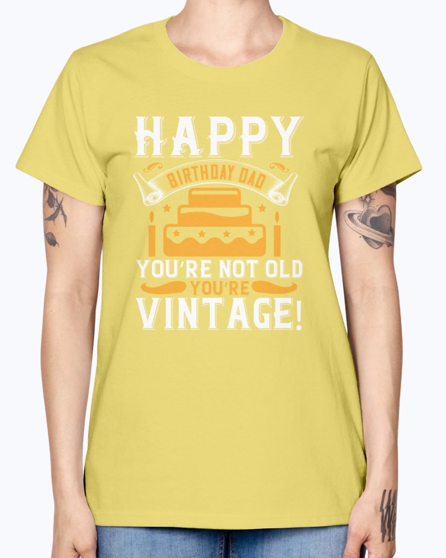 A stylish T-shirt with the phrase 'Happy birthday, Dad! You’re not old, you’re vintage!' printed on it, showcasing a vintage design.