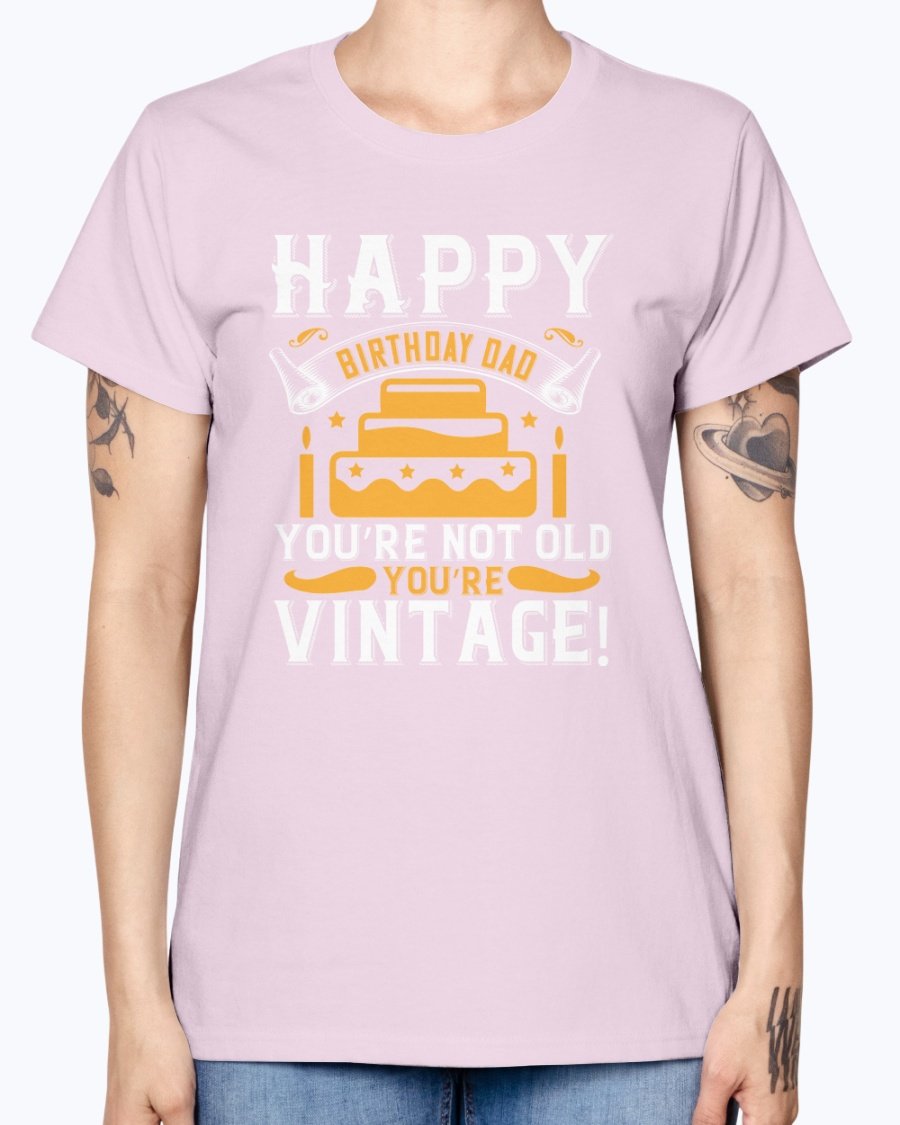 A stylish T-shirt with the phrase 'Happy birthday, Dad! You’re not old, you’re vintage!' printed on it, showcasing a vintage design.