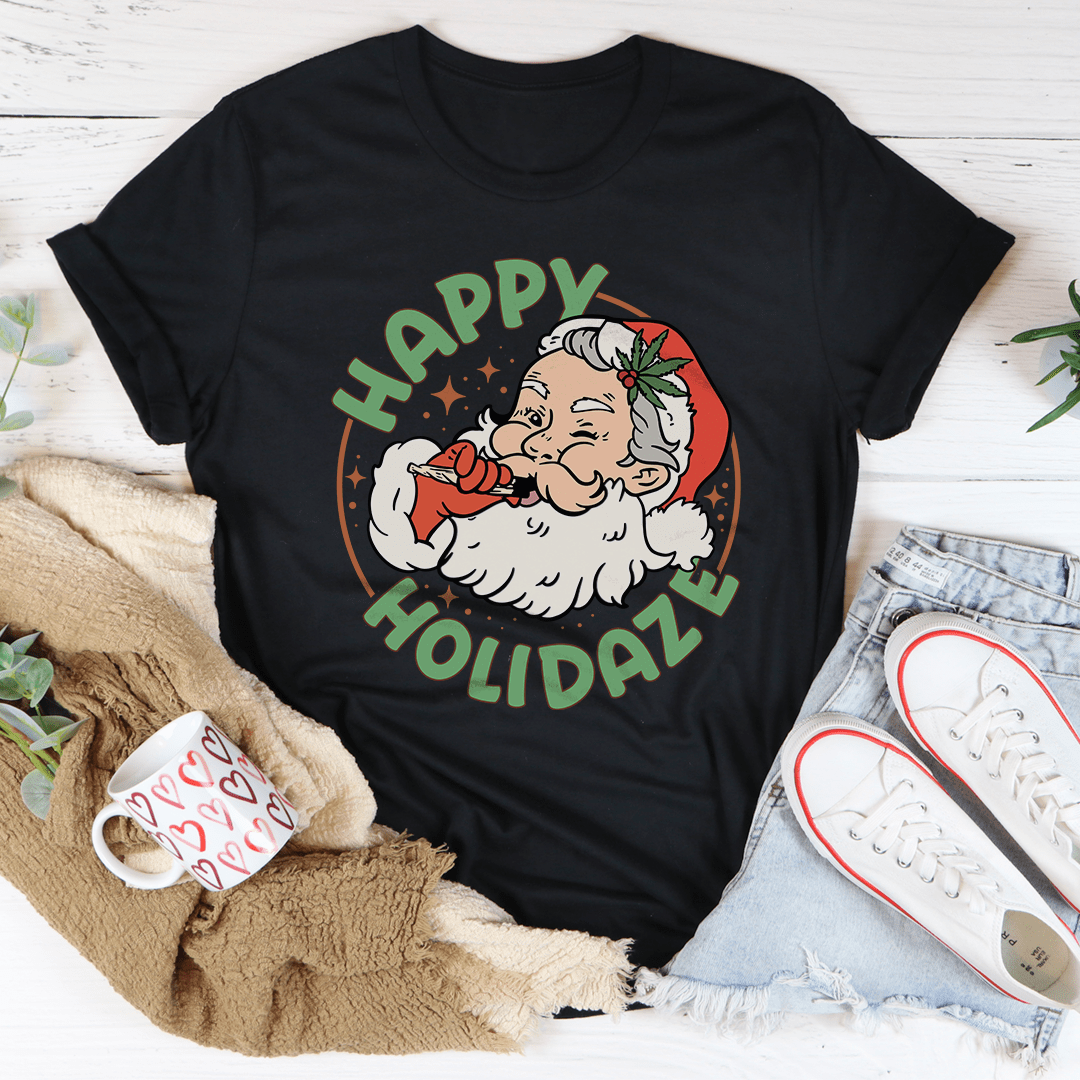 A festive Happy Holidaze Tee featuring a vibrant Christmas-themed print, made from 100% soft cotton, showcasing holiday cheer.