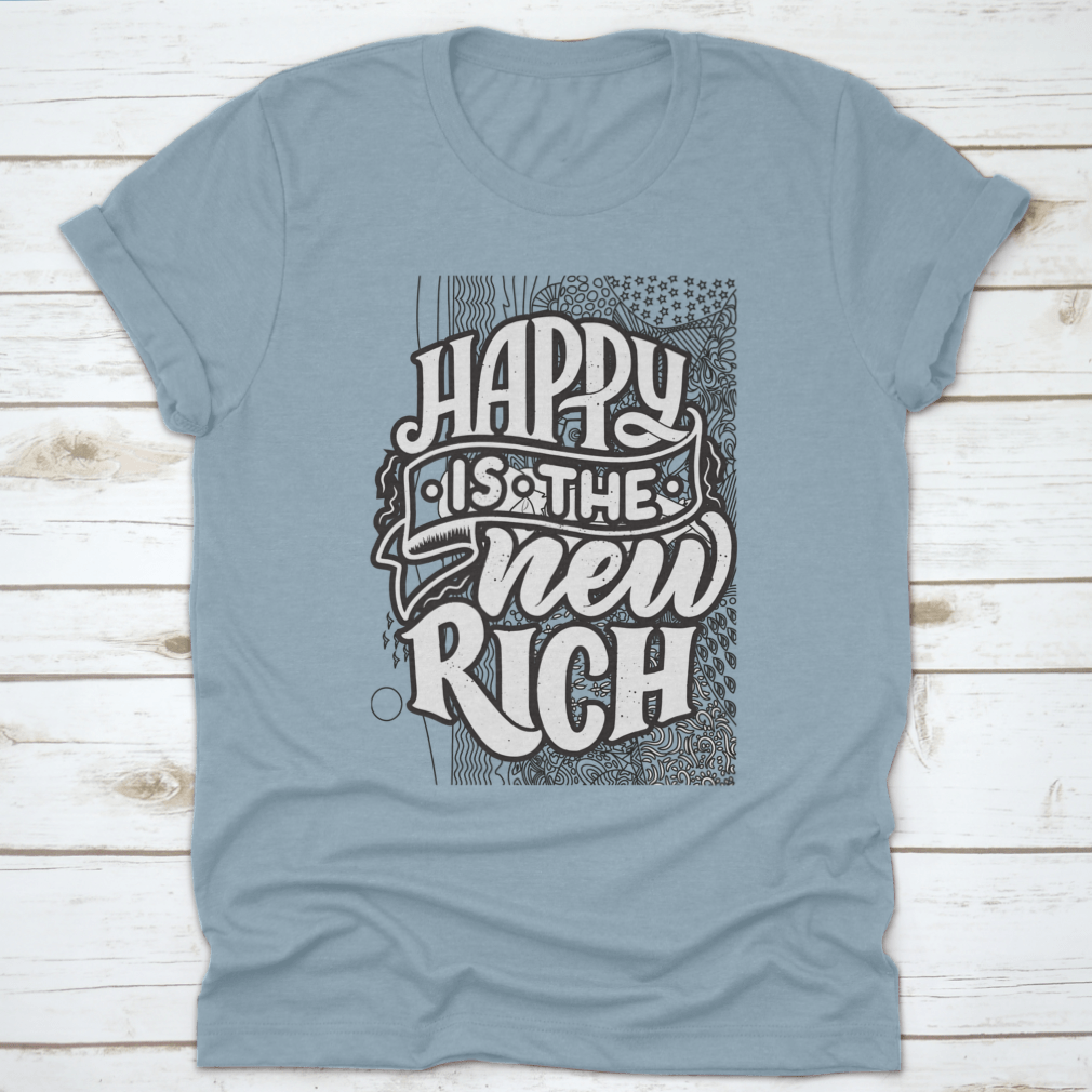 A soft cotton t-shirt featuring the inspirational phrase 'Happy Is The New Rich' in a stylish design, perfect for casual wear.
