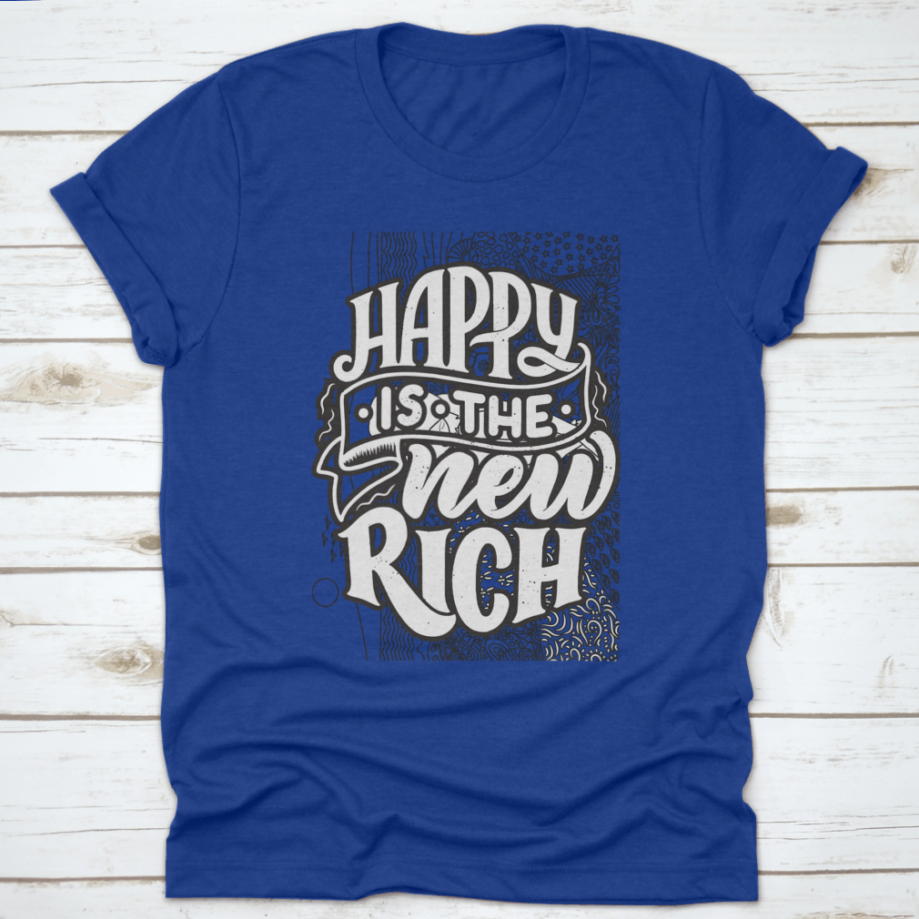 A soft cotton t-shirt featuring the inspirational phrase 'Happy Is The New Rich' in a stylish design, perfect for casual wear.