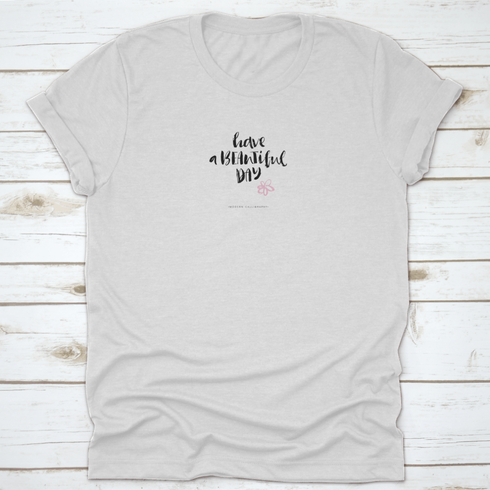 A stylish t-shirt featuring the motivational quote 'Have A Beautiful Day' designed for comfort and inspiration.
