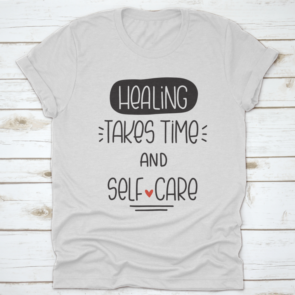 A comfortable t-shirt featuring the quote 'Healing Takes Time And Self-Care' in a stylish vector design, made from 100% cotton.
