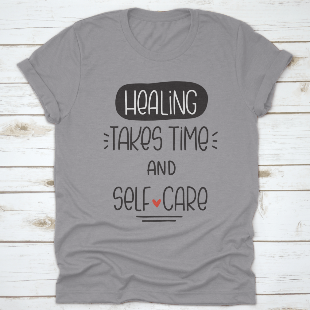 A comfortable t-shirt featuring the quote 'Healing Takes Time And Self-Care' in a stylish vector design, made from 100% cotton.