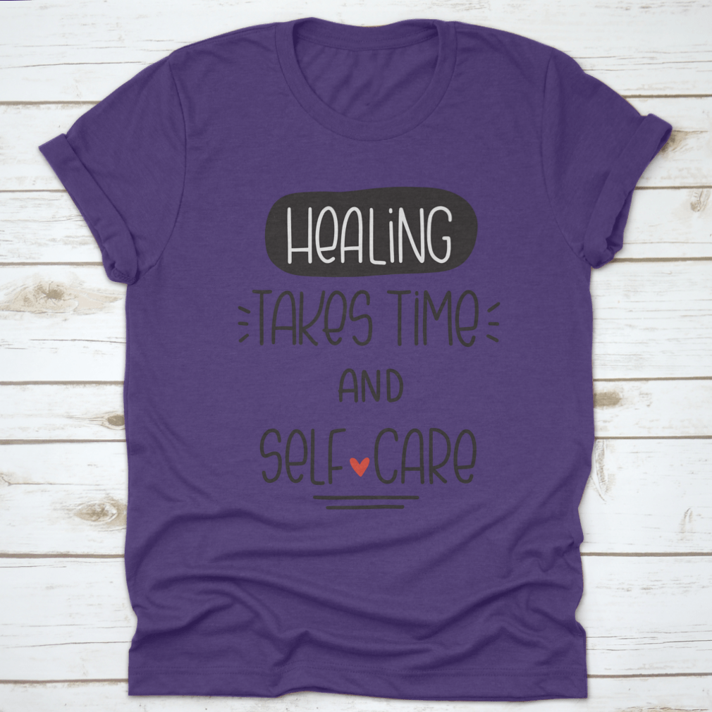 A comfortable t-shirt featuring the quote 'Healing Takes Time And Self-Care' in a stylish vector design, made from 100% cotton.