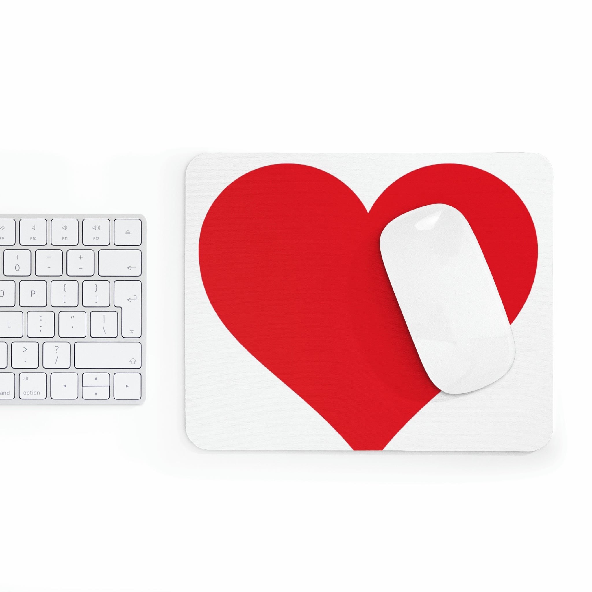 A stylish hearts design mouse pad with a non-slip rubber base, perfect for enhancing any workspace.