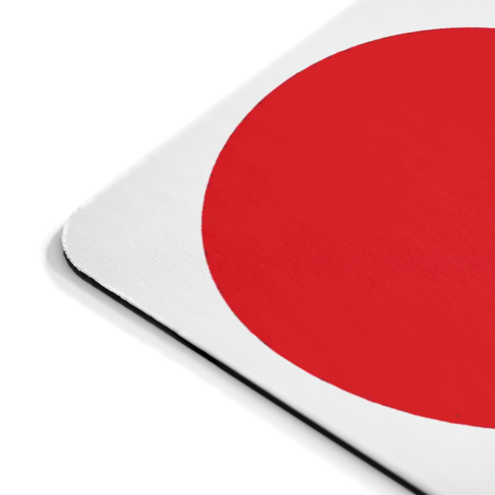 A stylish hearts design mouse pad with a non-slip rubber base, perfect for enhancing any workspace.