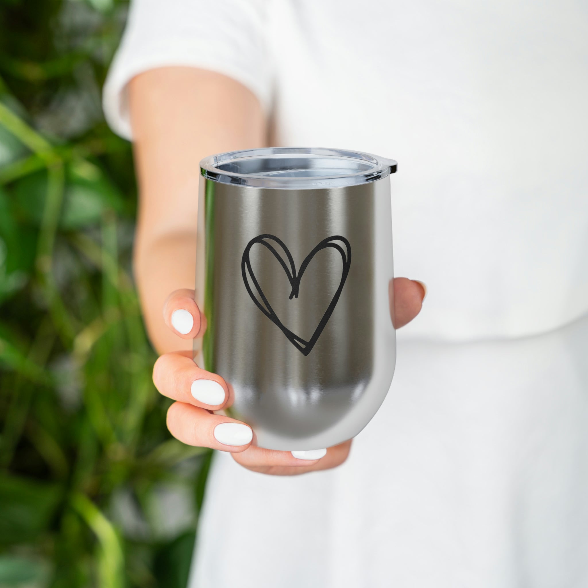 Hearts Wine Tumbler in stainless steel with a clear plastic lid, showcasing a stylish design perfect for hot and cold beverages.