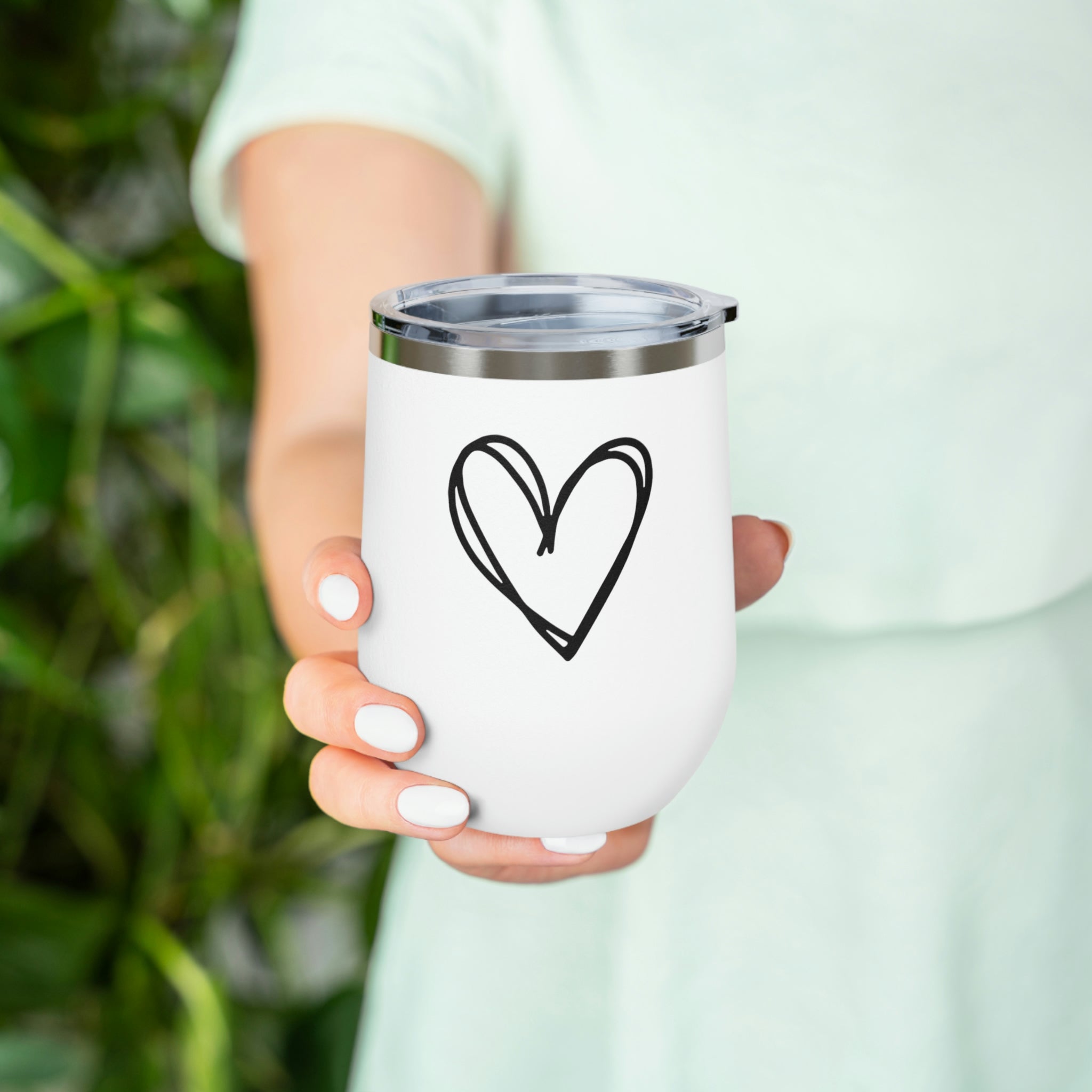 Hearts Wine Tumbler in stainless steel with a clear plastic lid, showcasing a stylish design perfect for hot and cold beverages.