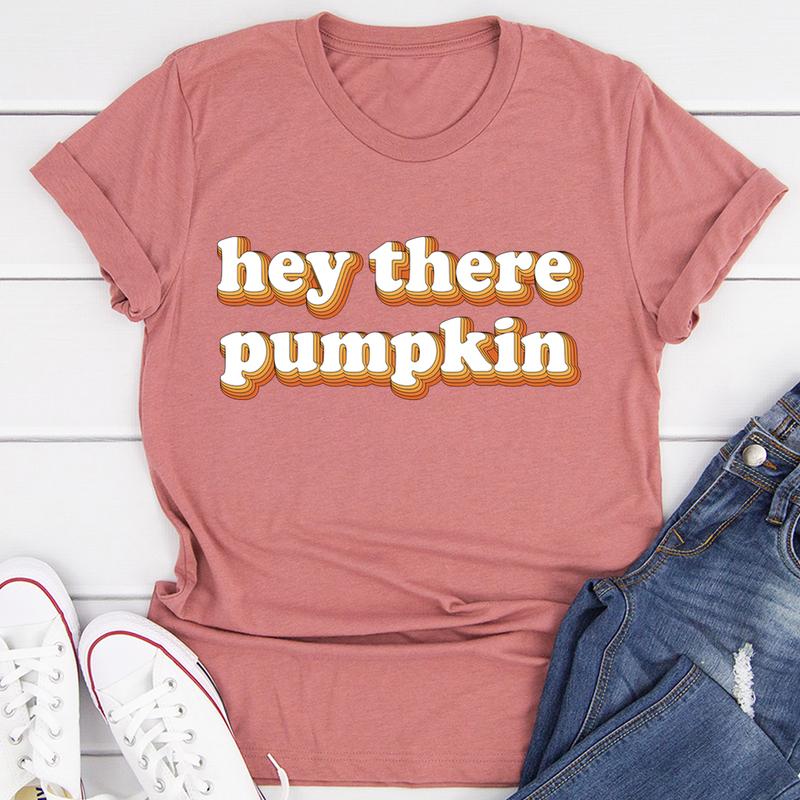 Hey There Pumpkin T-Shirt featuring a playful pumpkin graphic, made of soft ring-spun cotton with durable stitching.