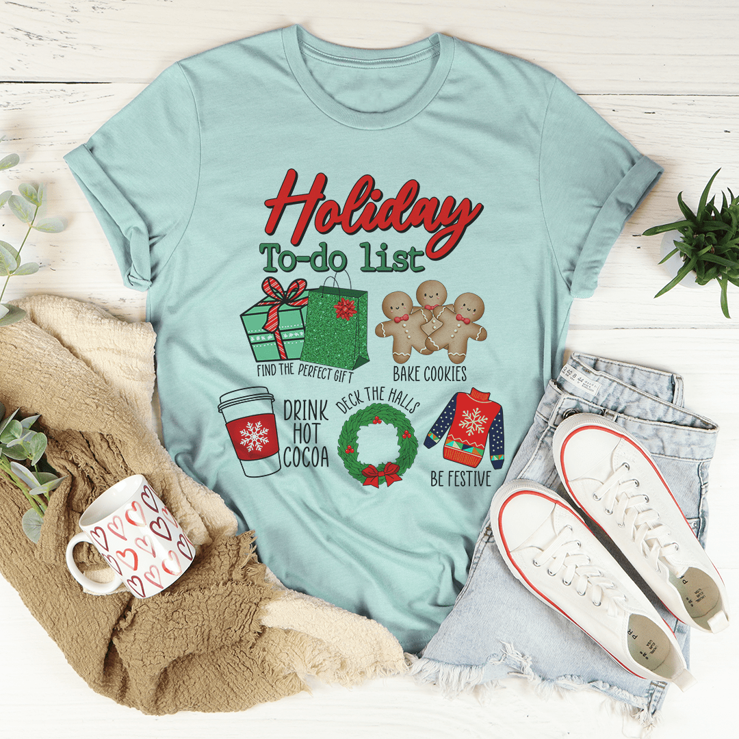 A festive Holiday To Do List tee featuring vibrant Christmas-themed digital print on soft cotton fabric, perfect for holiday celebrations.
