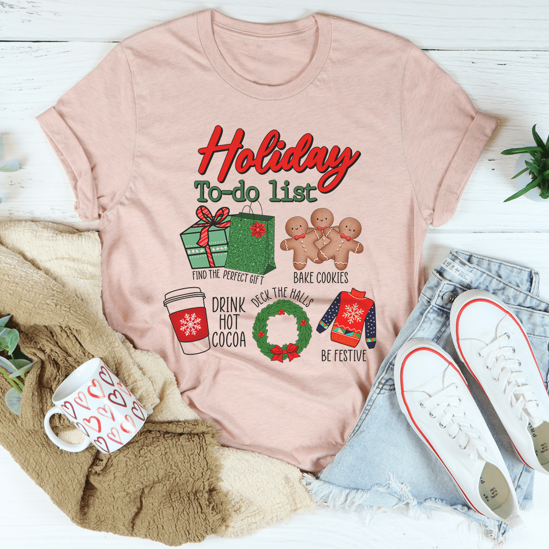 A festive Holiday To Do List tee featuring vibrant Christmas-themed digital print on soft cotton fabric, perfect for holiday celebrations.