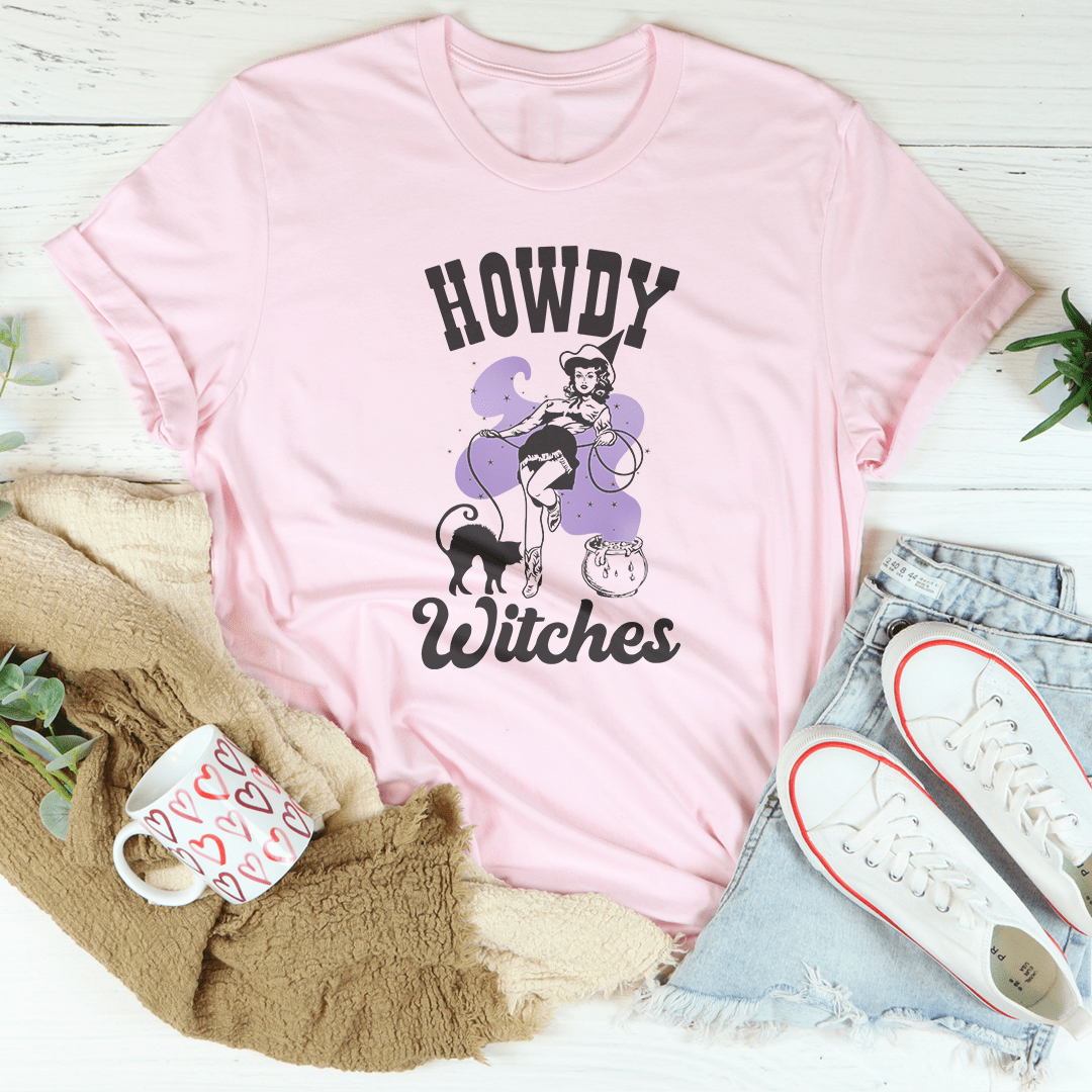 A stylish Howdy Witches Tee featuring vibrant Halloween-themed graphics, made from 100% soft cotton for comfort.