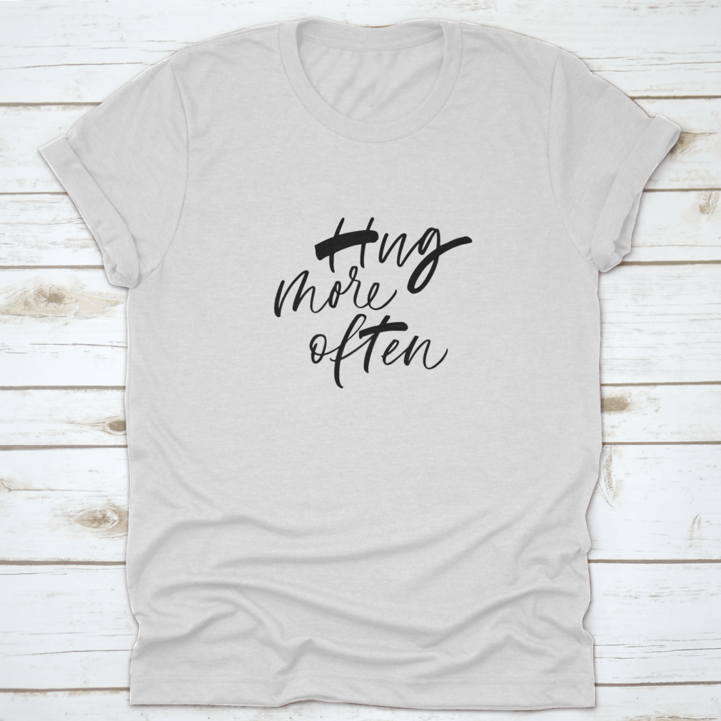 A motivational ink pen design featuring the phrase 'Hug More Often' in elegant freehand vector lettering, perfect for creative projects.