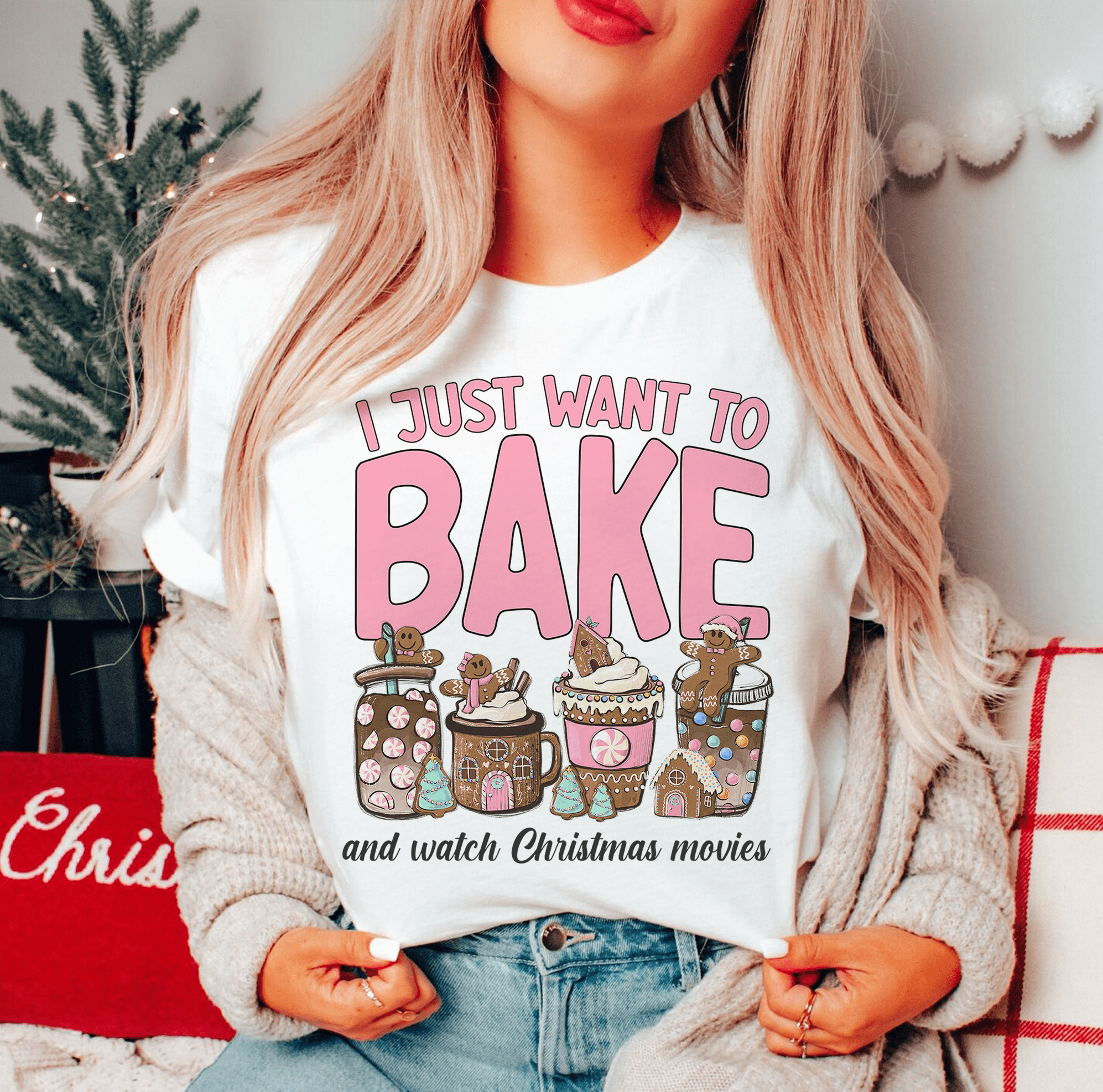A festive Christmas-themed tee featuring the phrase 'I Just Want To Bake And Watch Christmas Movies', made from soft cotton.