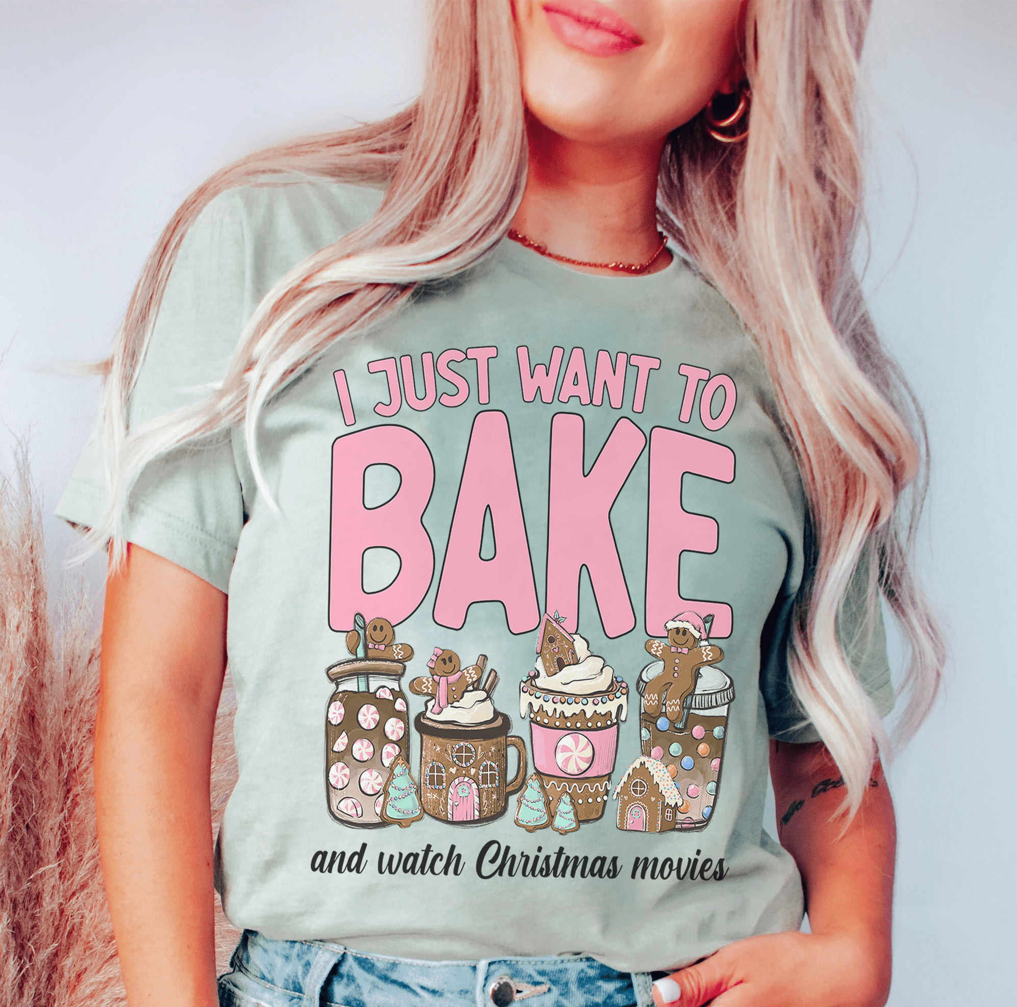 A festive Christmas-themed tee featuring the phrase 'I Just Want To Bake And Watch Christmas Movies', made from soft cotton.