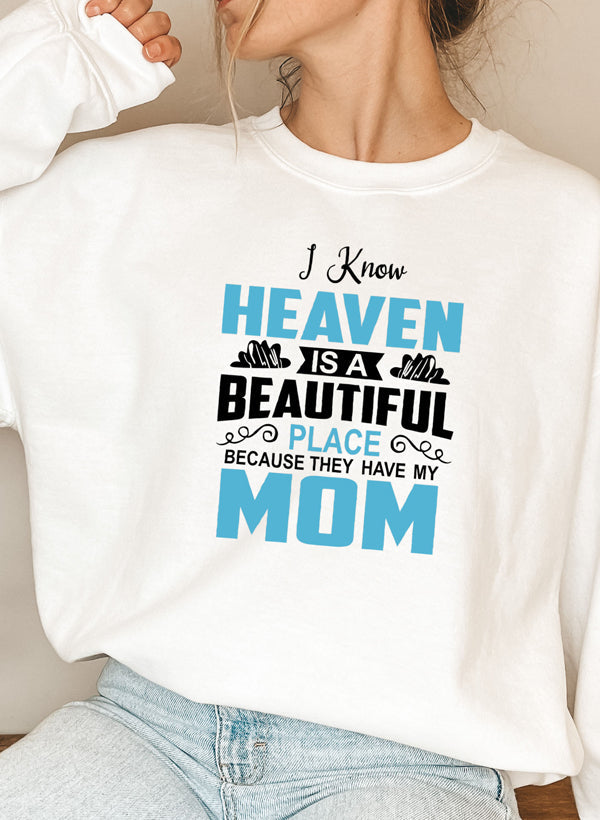 I Know Heaven Is A Beautiful Place Mom Sweat Shirt featuring a cozy fleece lining and adjustable cuffs, perfect for stylish comfort.
