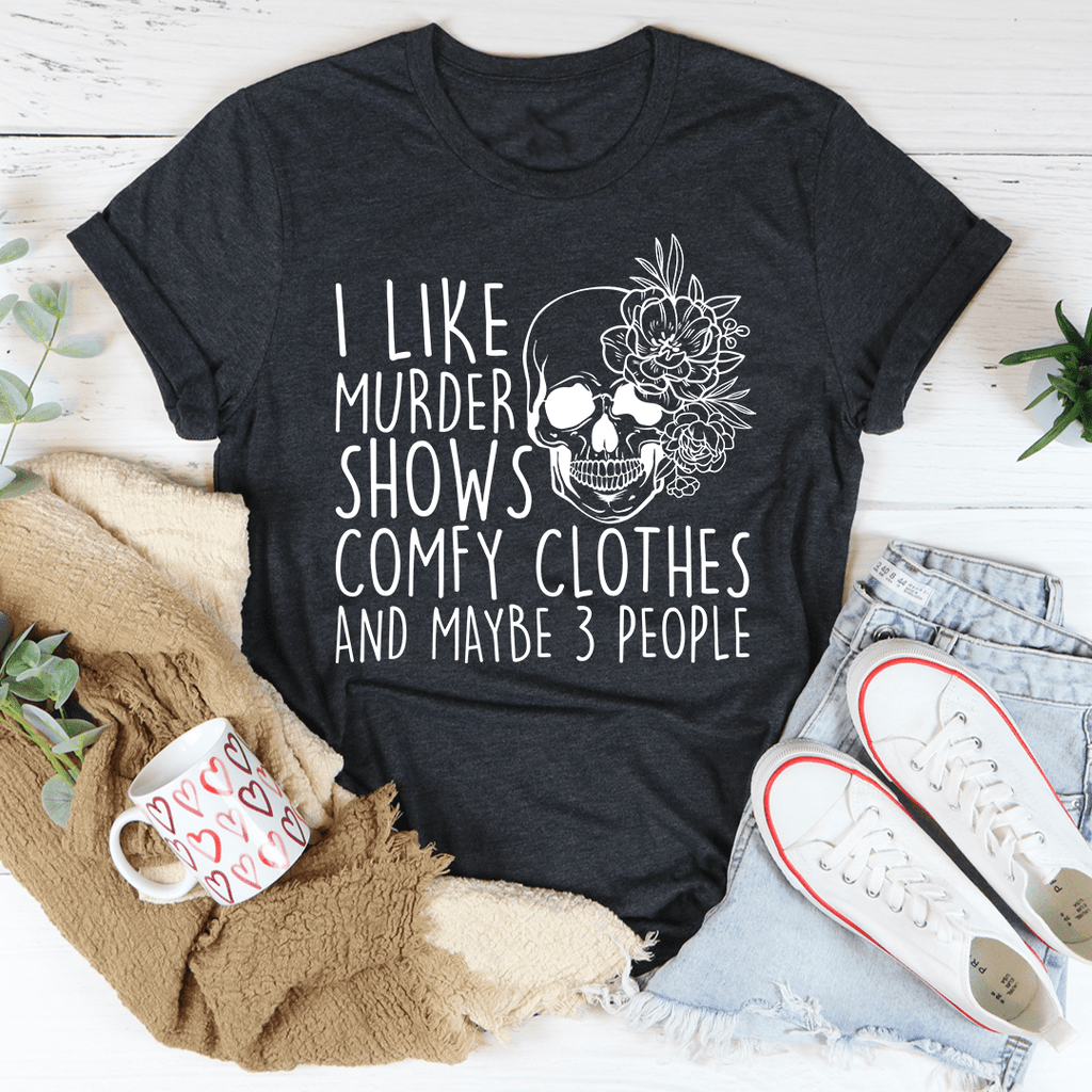 A comfortable t-shirt featuring the phrase 'I Like Murder Shows Comfy Clothes And Maybe 3 People' printed on it, showcasing its soft fabric and durable stitching.