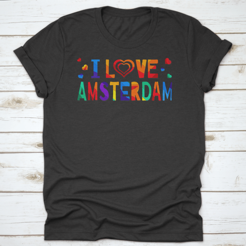 A colorful T-shirt featuring a funny cartoon inscription that says 'I Love Amsterdam', showcasing vibrant colors and a playful design.