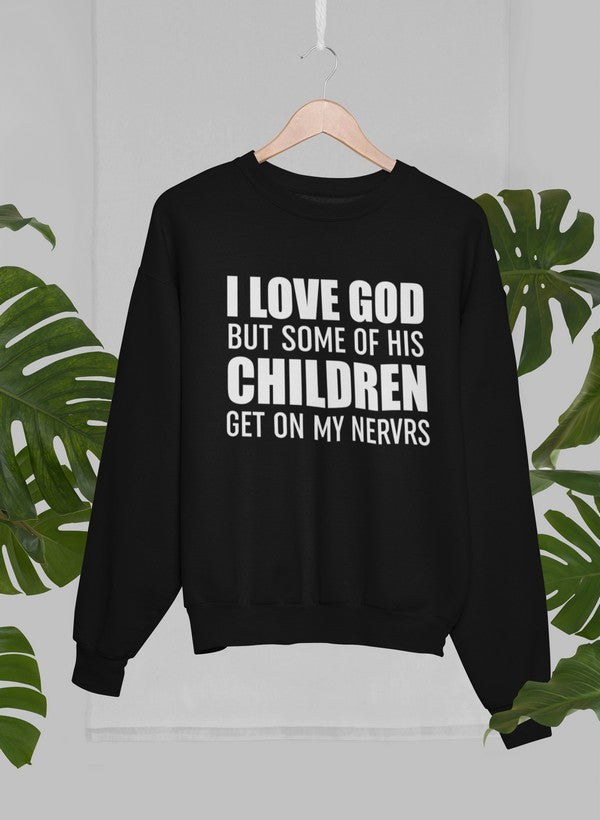 A cozy sweatshirt featuring the phrase 'I Love God But Some Of His Children Get On My Nerves', showcasing a humorous design.