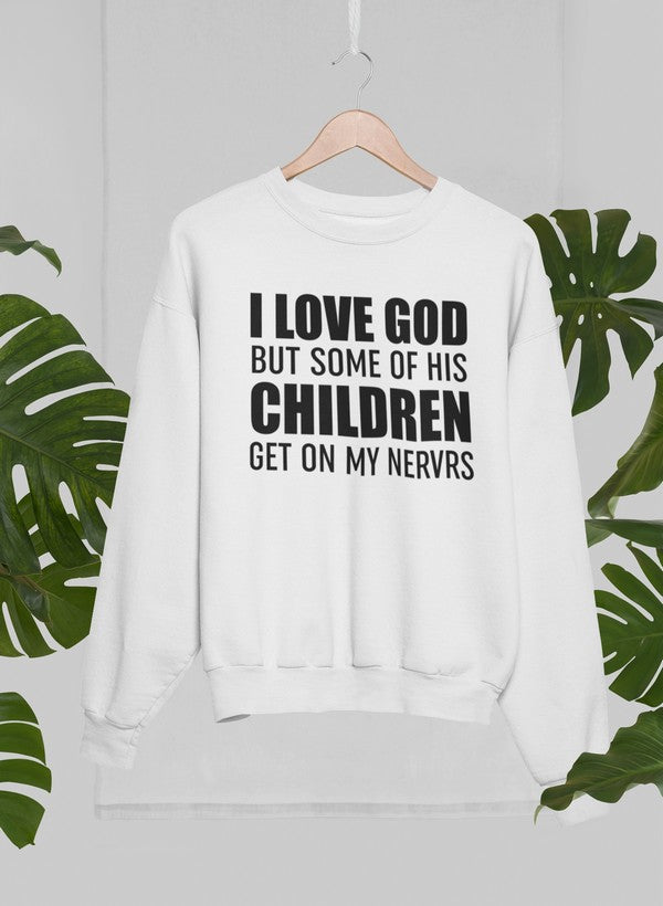 A cozy sweatshirt featuring the phrase 'I Love God But Some Of His Children Get On My Nerves', showcasing a humorous design.