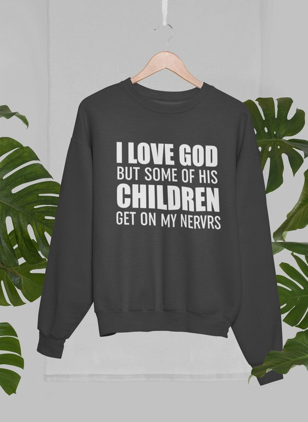 A cozy sweatshirt featuring the phrase 'I Love God But Some Of His Children Get On My Nerves', showcasing a humorous design.