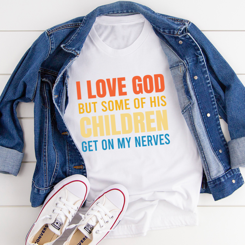 A soft, durable t-shirt featuring the phrase 'I Love God But Some Of His Children' printed on the front, showcasing its comfortable fit and quality fabric.