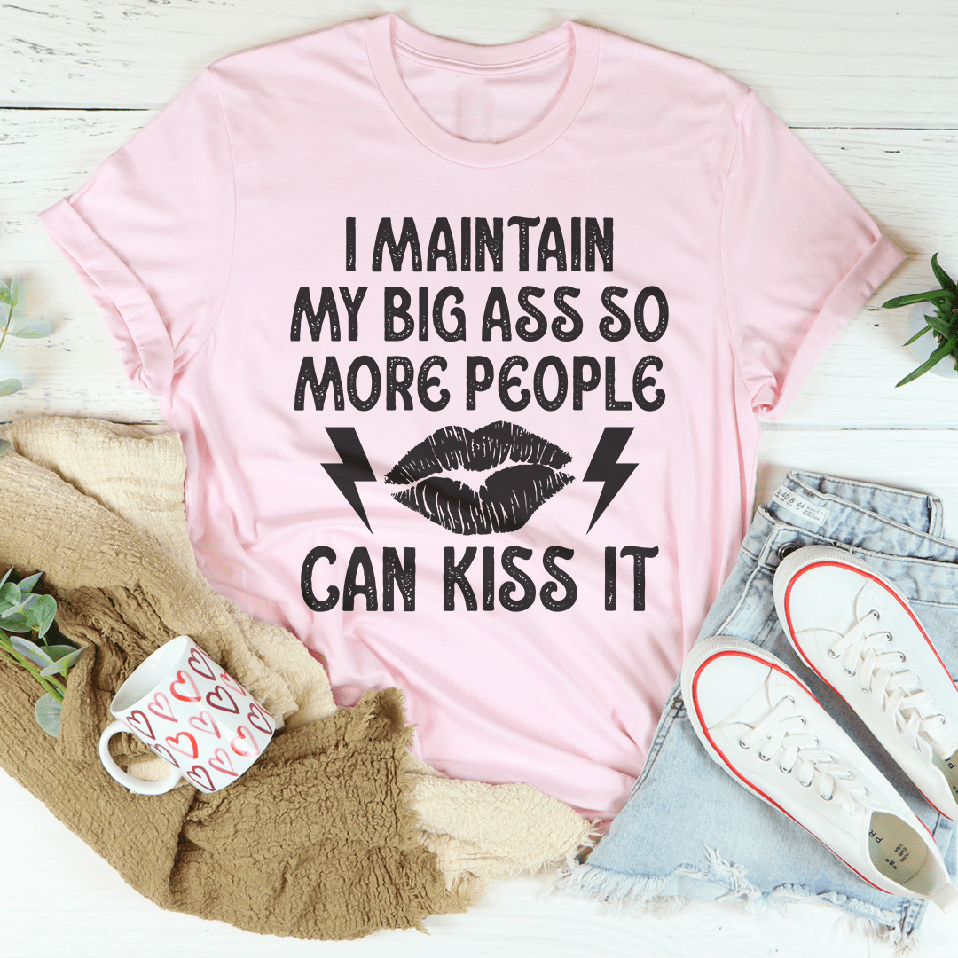 A stylish black t-shirt with the phrase 'I Maintain My Big Butt So More People Can Kiss It' printed in bold letters, showcasing a fun and confident design.