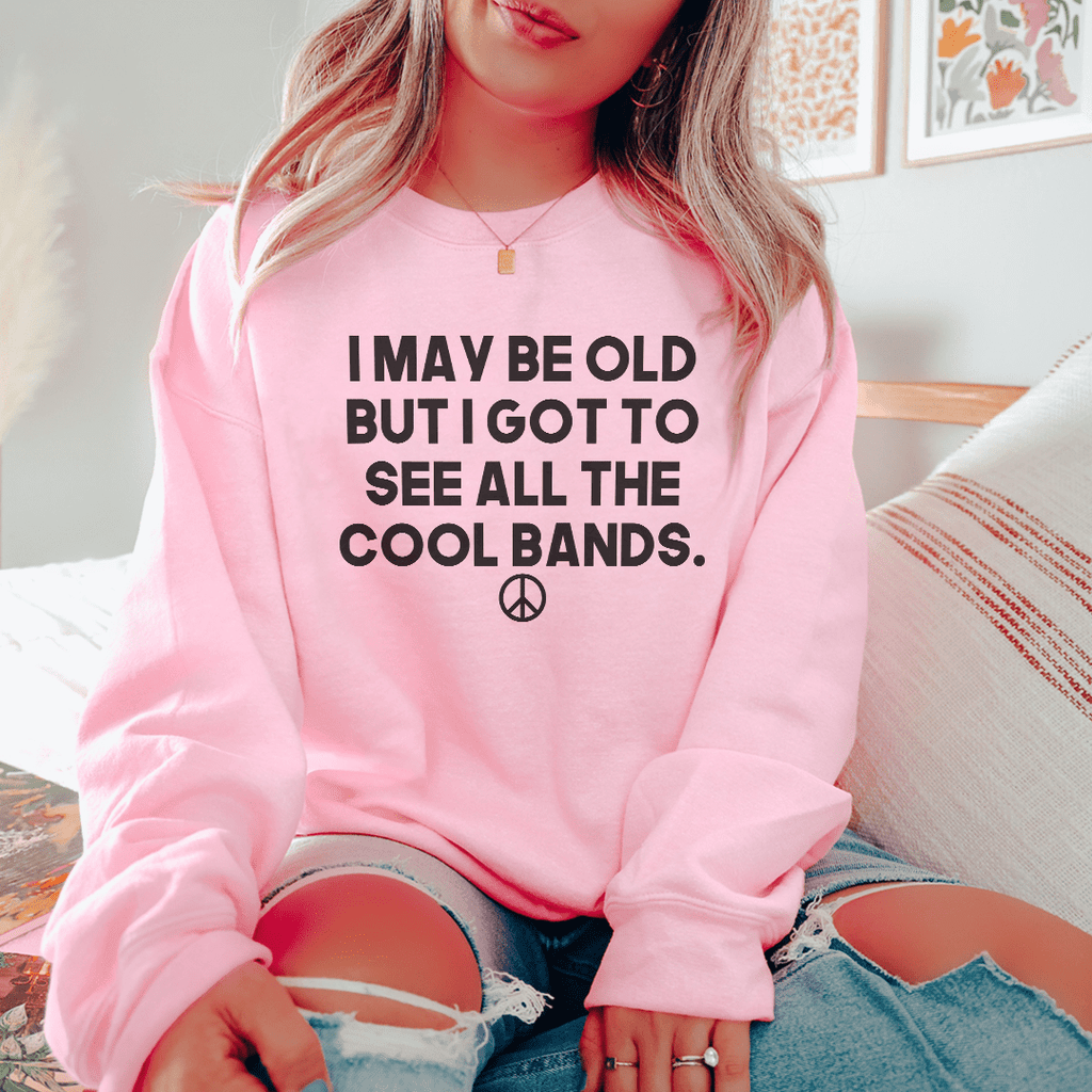 I May Be Old But I Got To See All The Cool Bands Sweatshirt T-Shirt in various colors, showcasing its soft fabric and stylish design.
