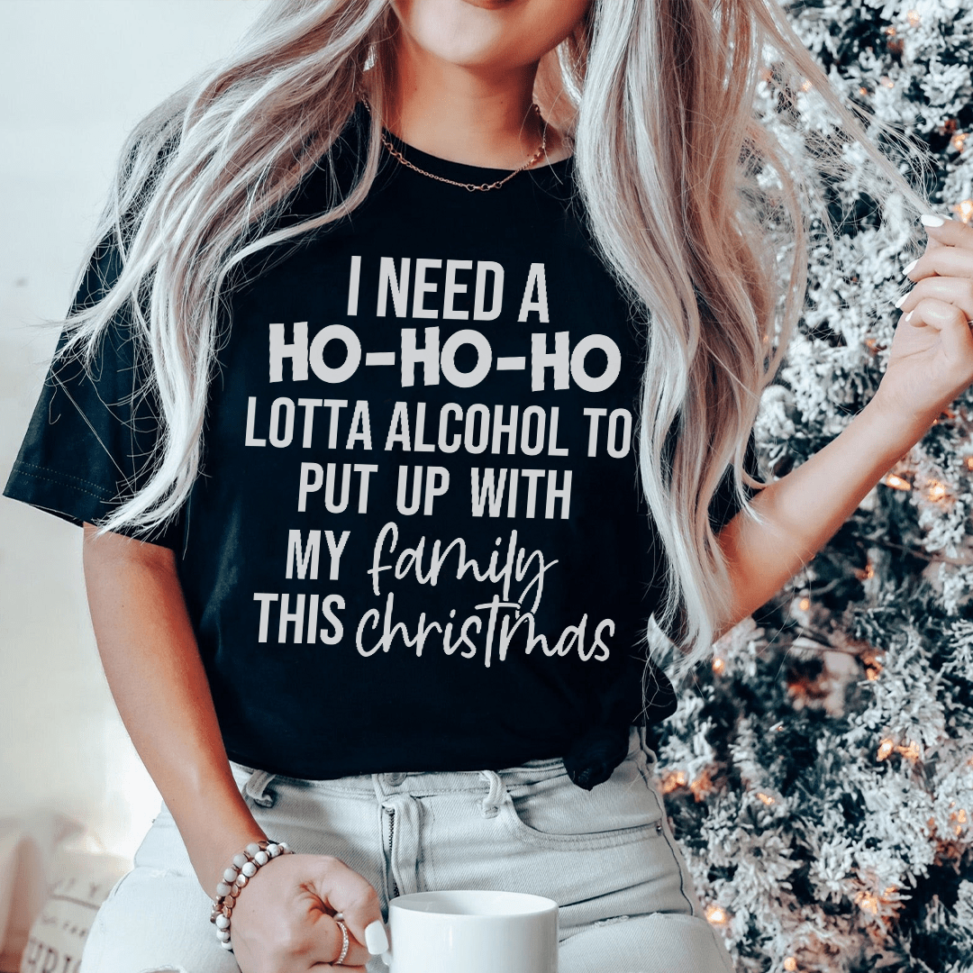 A festive 'I Need A Ho Ho Ho Lotta Alcohol Tee' made from 100% soft cotton, featuring a vibrant holiday-themed design.