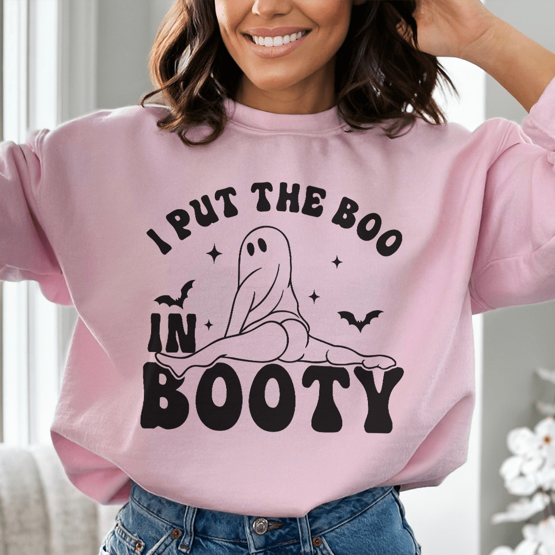 A cozy hoodie featuring the phrase 'I Put The Boo In Booty', designed by top artists, showcasing a unique and stylish look.