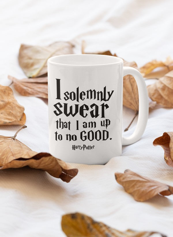 I Solemnly Swear Mug featuring a glossy finish and sturdy handle, perfect for coffee lovers.