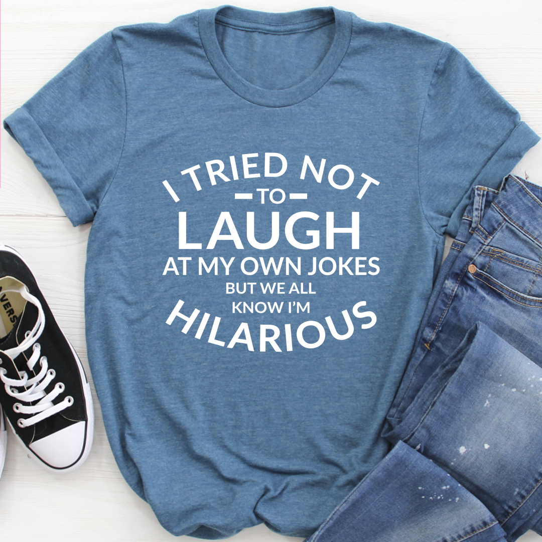 I Tried Not To Laugh At My Own Jokes T-Shirt displayed on a mannequin, showcasing its soft cotton fabric and humorous design.
