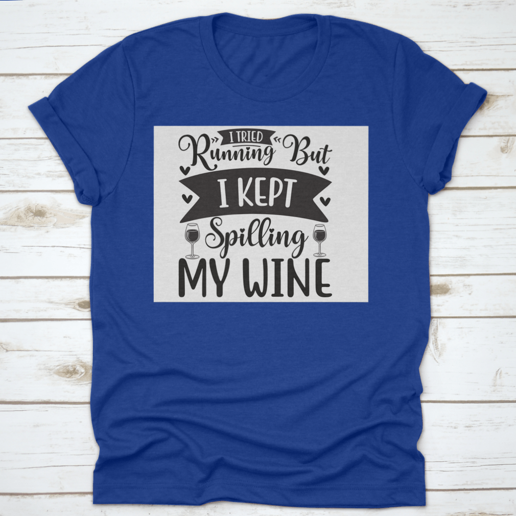 A humorous T-shirt featuring the phrase 'I Tried Running But I Kept Spilling My Wine', showcasing a classic fit and soft fabric.
