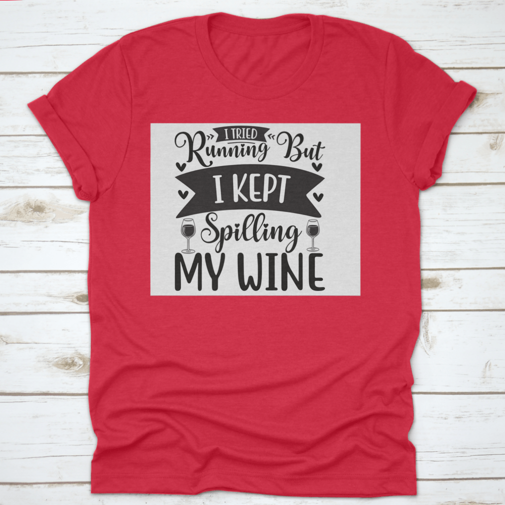A humorous T-shirt featuring the phrase 'I Tried Running But I Kept Spilling My Wine', showcasing a classic fit and soft fabric.