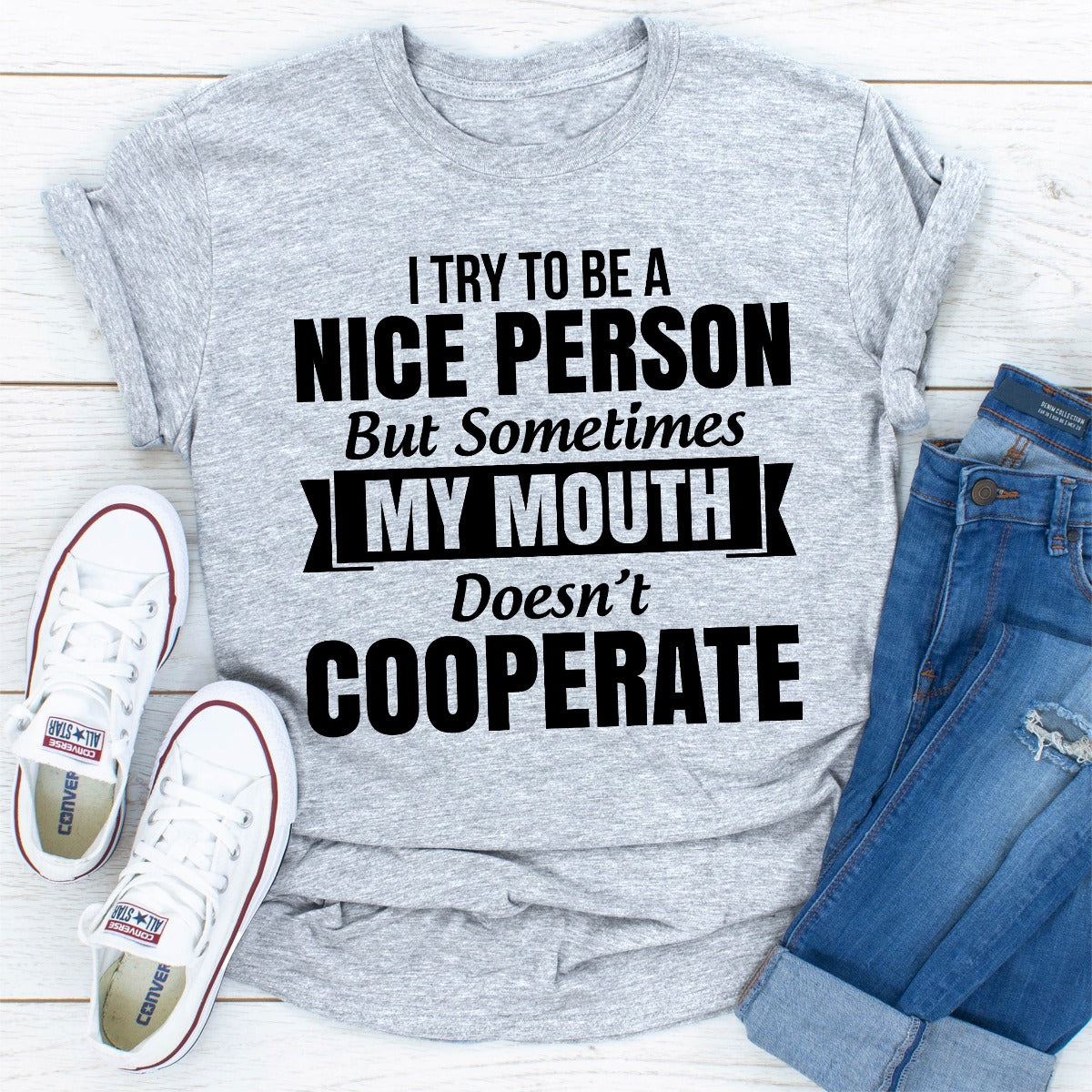 I Tried To Be A Nice Person T-Shirt displayed on a mannequin, showcasing its soft cotton fabric and playful design.